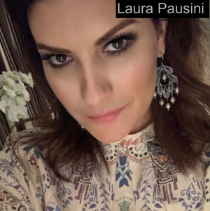 Laura Pausini wearing Yvone Christa