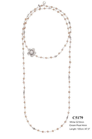 Long pearl necklace with small flower